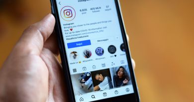 Close-up of a smartphone displaying an Instagram profile screen.
